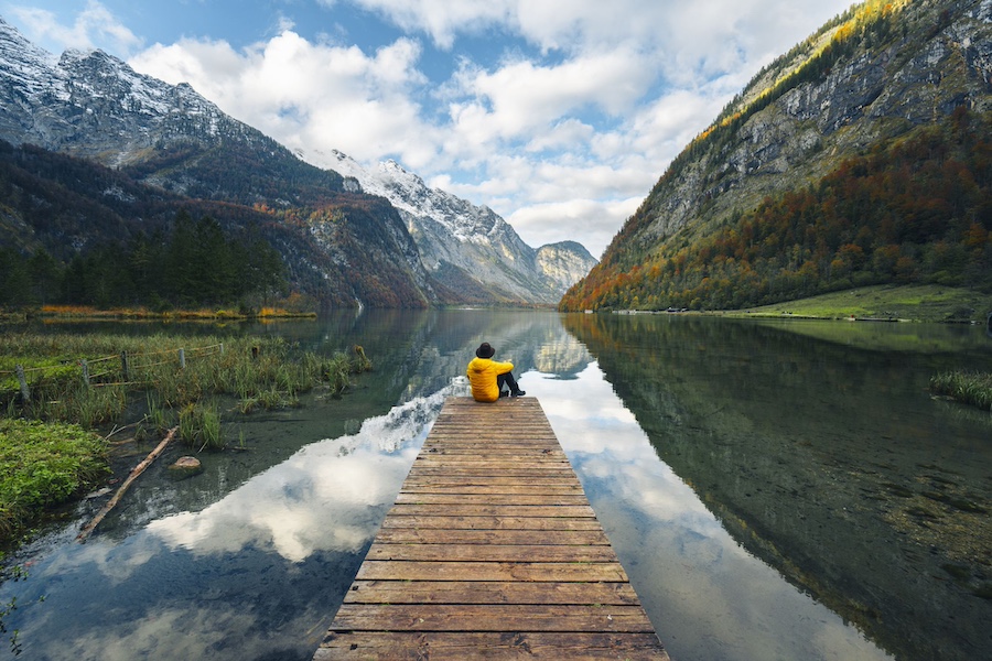 Man sitting on a wooden dock